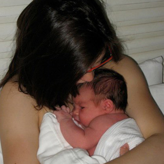 Kate with Adelle just after she was born