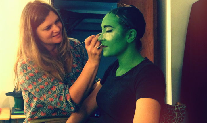Christina gets the awesome job of painting the wicked witch green every night.